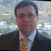 Professional headshot of Rafeh from Blockchain Intelligence Group, showcasing a confident, business-ready appearance.